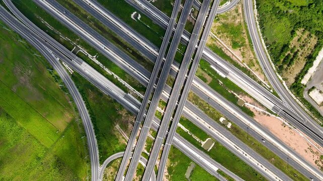 Slow motion drone footage aerial view bridge intersection between the highway numbers 290 and 304 Nakhon Ratchasima