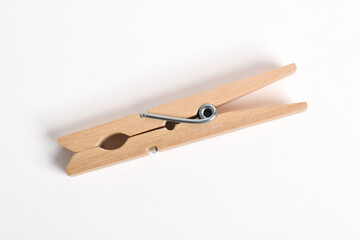 Wooden clothes pin isolated on white background with clipping path