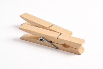 Wooden clothes pin isolated on white background with clipping path