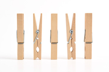 Set of Wooden clothes pin isolated on white background