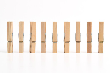 Set of Wooden clothes pin isolated on white background