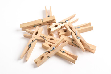 Pile of Wooden clothes pin isolated on white background