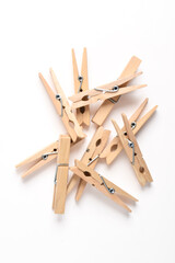 Pile of Wooden clothes pin isolated on white background