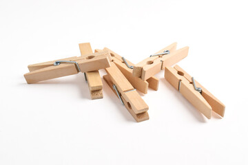 Pile of Wooden clothes pin isolated on white background