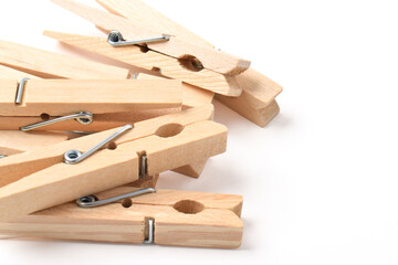 Pile of Wooden clothes pin isolated on white background with copy space for text