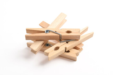 Pile of Wooden clothes pin isolated on white background