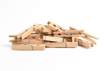 Pile of Wooden clothes pin isolated on white background