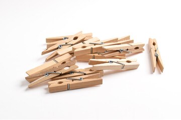 Pile of Wooden clothes pin isolated on white background