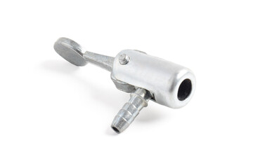 Close-up of a metal air chuck or tire inflator nozzle used for connecting air compressors to tire valves, isolated on white background.