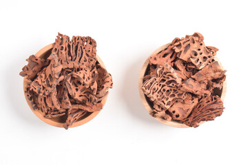 Ant Nest (Myrmecodia pendans), a traditional medicinal plant with porous, woody structure, isolated...