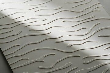 Obraz premium Subtle embossed wavy lines pattern with soft sunlight and shadow