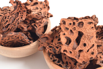 Close-up of Ant Nest (Myrmecodia pendans), a traditional medicinal plant with porous, woody...