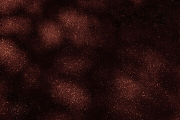 Red brown galaxy space glitter background. Starry night sky. Photo can be used for Christmas, New Year and all celebrations background concepts.