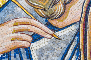 Close-up of Ancient Mosaic Art with Hand and Stylus
