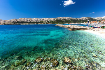 Azure blue water in the Adriatic Sea in Baska on the island of KRK in Croatia