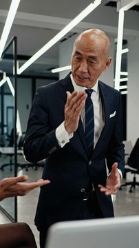 Bald in the middle head and begin no loss hair glabrous of mature Asian business smart active office man.