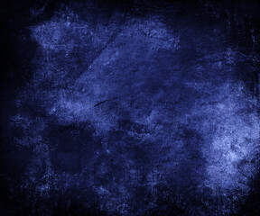 Dark blue grunge damaged background, uneven texture, copy space