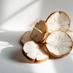 Sliced Burdock Root Still Life Simple Light and Shadow Aesthetic Studio Composition for Health and Wellness Concept