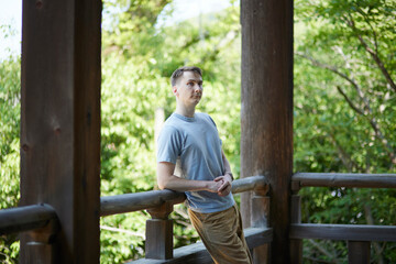 Tourist resting on temple veranda