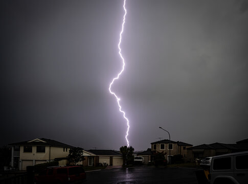storm in suburbs lightning strike down the centre