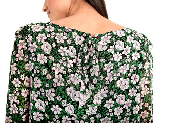 Détail, Robe verte à fleurs sur fond blanc