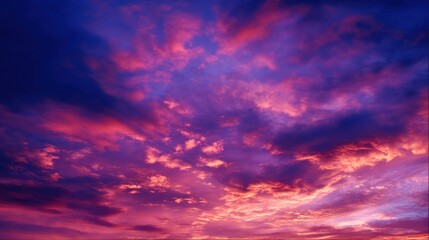 Fototapeta premium Dramatic Purple and Pink Sky with Cumulus Clouds at Twilight Hour Scenery