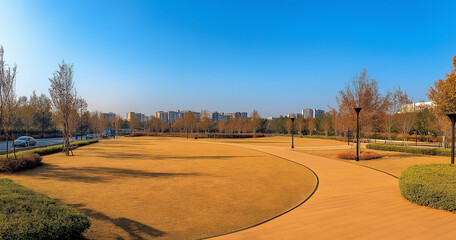 Fototapeta premium A blue park with a lawn, street lamps, and a road in the city of Fuzhou, China.