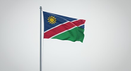 Namibia's National Flag Flutters Proudly Against a Soft Grey Sky