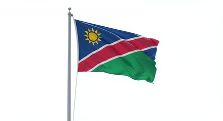 Namibia's vibrant flag billows proudly against a clear sky, a symbol of national pride.