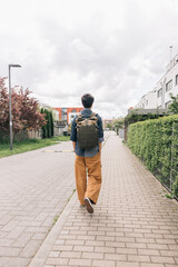 Girl student walking alone in the morning going to college