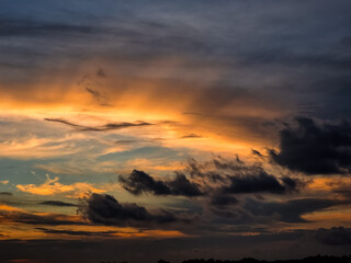 Fototapeta premium Beautiful sky background in the afternoon- Sunset sky with orange light clouds in summer season
