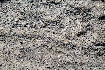 The background is made of gray pumice stone. Texture backgrounds for wallpaper design graphics.