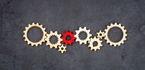 Wooden cogwheels on black background