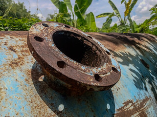 Rusty pipe opening industrial decay