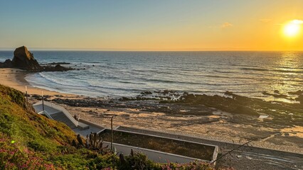 Golden sun casting tranquil whispers over rugged shoreline invites contemplation, echoing summer...