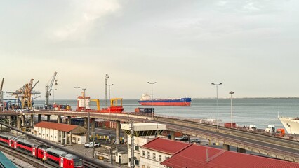 Rusty red trains snake through bustling harbor, maritime nostalgia, cargo ship tranquility, World...