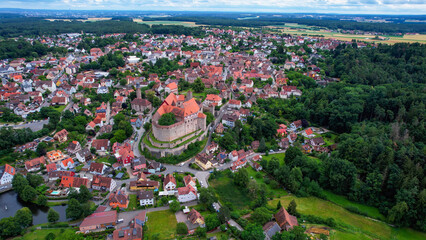 A panoramic aerial view around the old town in Cadolzburg Germany on a cloudy spring morning