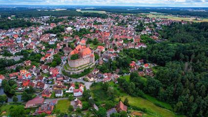 A panoramic aerial view around the old town in Cadolzburg Germany on a cloudy spring morning