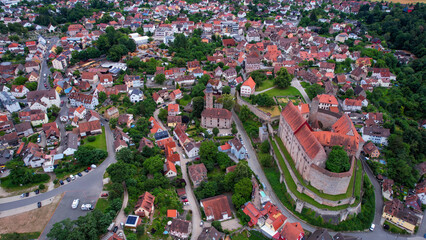 A panoramic aerial view around the old town in Cadolzburg Germany on a cloudy spring morning