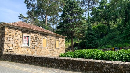 Old stone cottage whispers ancient tales amidst verdant serenity, evoking Midsummer celebrations...