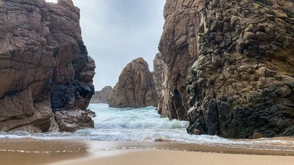 Breathtaking coastal rock passage, whispers of Poseidons realm, alluring tides, celebrated on World...