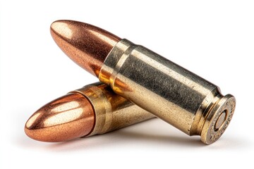 Two bullets one stacked on the other against a white background
