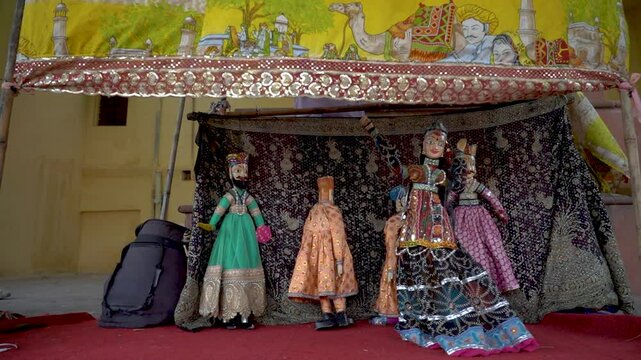 Rajasthani puppets are crafted using a combination of wood, cloth, and strings. Puppetry art is called as &ldquo;Kathputli&rdquo;