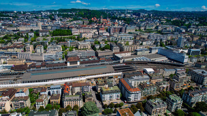 A panoramic aerial view around the old town of the city Lausanne in Switzerland on a sunny spring...