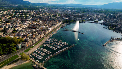 A panoramic aerial view around the old town of the city Geneva in Switzerland on a sunny spring noon
