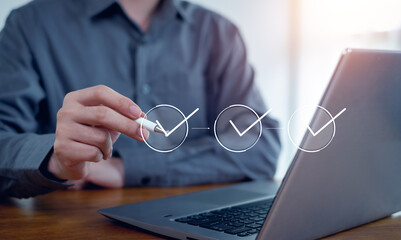 Businessman mark checkboxes, Survey form, check marks on checklist,Checklist concept.