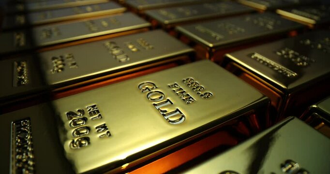 Numerous gold bars arranged in precise grid create captivating visual of wealth and investment. Financial security and allure of precious metals