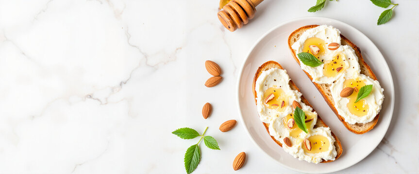 Delicious ricotta toast with honey and mint on marble countertop, gourmet delight - Powered by Adobe