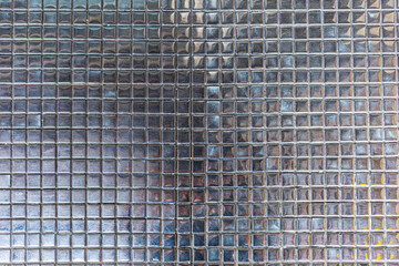 Obraz premium Reflective Metallic Square Tile Surface Texture