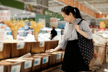 Woman Shopping for Grains in Grocery Store